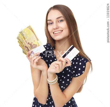 Woman with money and credit card 11019824