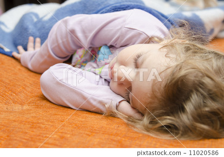 Girl sleeping on the couch Girl sleeping on the couch 11020586