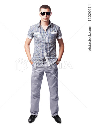 young man in sunglasses isolated on white background. Full lengt 11020614