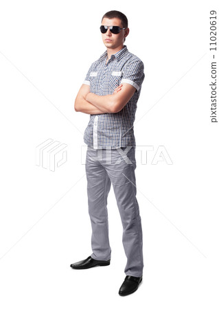 serious young man in sunglasses isolated on white background. Fu 11020619