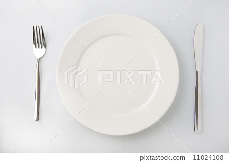 White dish and knife fork White dish and knife fork 11024108