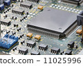 close up of electronic circuit board with processor 11025996