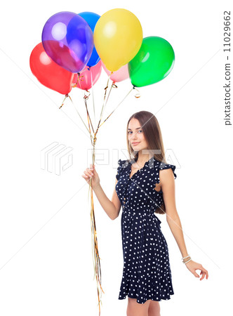 Beautiful woman with colorful balloons 11029662