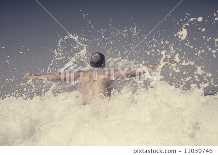 Man in the wave 11030746