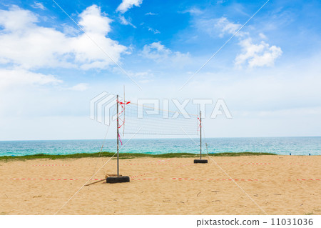 Volleyball net on the beach Volleyball net on the beach 11031036