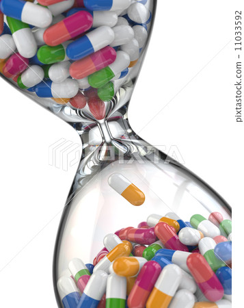 Time of medicine. Pills in hourglass 11033592