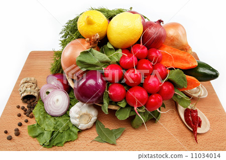 Healthy food. Fresh vegetables and fruits on a wooden table. Healthy food. Fresh vegetables and fruits on a wooden table. 11034014