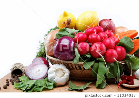 Healthy food. Fresh vegetables and fruits on a wooden table. Healthy food. Fresh vegetables and fruits on a wooden table. 11034015