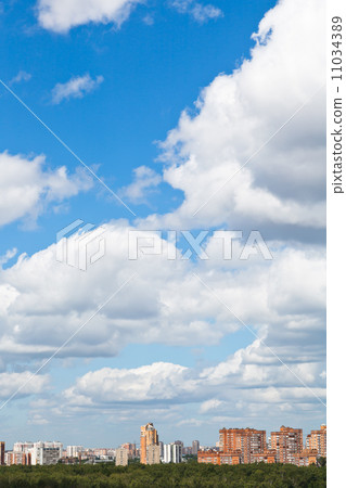 woolpack clouds over urban district woolpack clouds over urban district 11034389