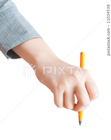 female hand writing by yellow pen isolated female hand writing by yellow pen isolated 11034539