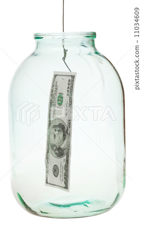 catching 100 dollars banknote from glass jar 11034609