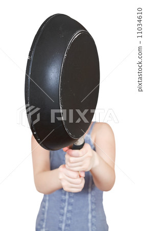 woman with frying pan close up woman with frying pan close up 11034610