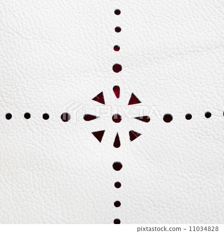 perforated pattern on white leather 11034828