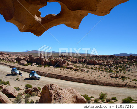Two jeeps in lava field Two jeeps in lava field 11037216