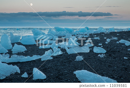 blue icebergs and sea with full moon blue icebergs and sea with full moon 11039381