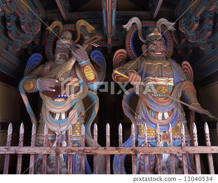 Four Buddhist statues of the Buddhist temple Tenno gate Four Buddhist statues of the Buddhist temple Tenno gate 11040534
