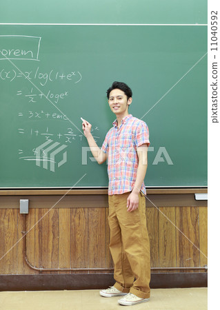 University students lined up in front of the blackboard 11040592