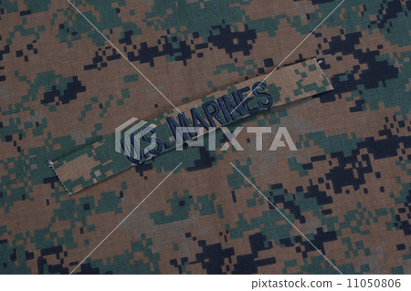 US  Marines concept with service tapes and camouflaged uniform 11050806
