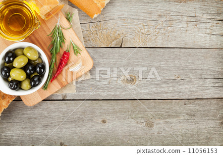 Italian food appetizer of olives, bread and spices 11056153