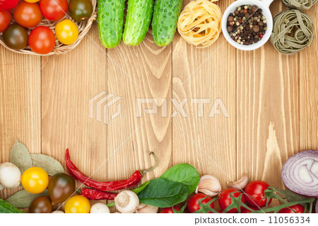 Fresh ingredients for cooking: pasta, tomato, cucumber, mushroom Fresh ingredients for cooking: pasta, tomato, cucumber, mushroom 11056334