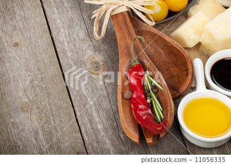 Herbs, spices, tomatoes and cheese Herbs, spices, tomatoes and cheese 11056335