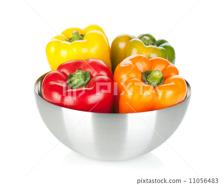 Four bell peppers in a bowl 11056483