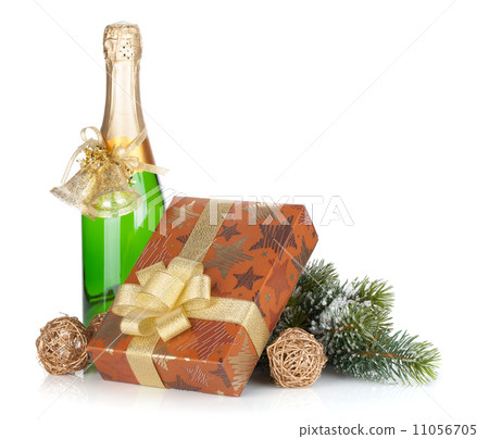 Champagne bottle, christmas gift box, decor and fir tree 11056705