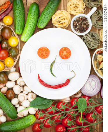 Fresh ingredients for cooking: pasta, tomato, cucumber, mushroom 11057484