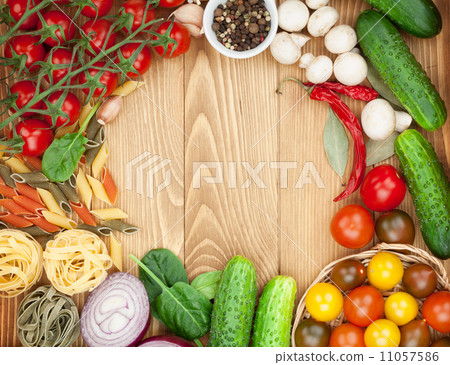 Fresh ingredients for cooking: pasta, tomatoes, cucumbers, mushr Fresh ingredients for cooking: pasta, tomatoes, cucumbers, mushr 11057586