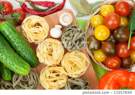 Fresh ingredients for cooking: pasta, tomato, cucumber, mushroom Fresh ingredients for cooking: pasta, tomato, cucumber, mushroom 11057699