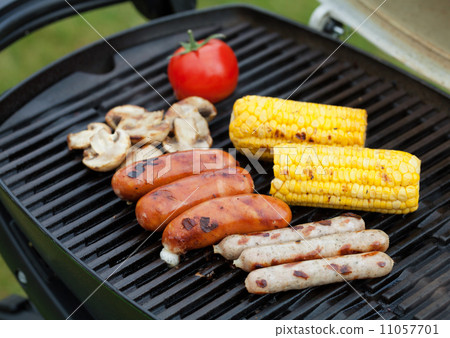 Grill bbq sausages and vegetables Grill bbq sausages and vegetables 11057701