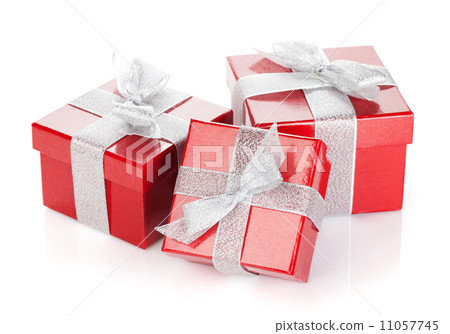 Three red gift boxes with silver ribbon and bow 11057745