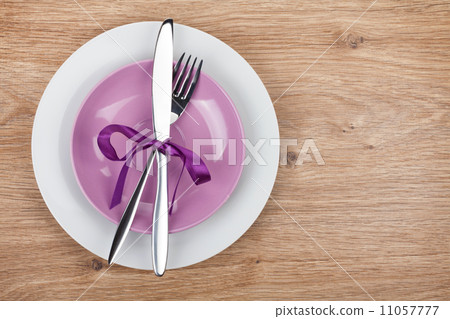 Fork with knife over plates Fork with knife over plates 11057777