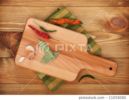 Herbs and spices on cutting board Herbs and spices on cutting board 11058080