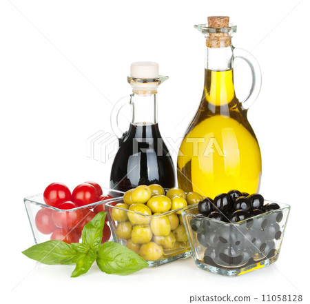 Olives, tomatoes, herbs and condiments Olives, tomatoes, herbs and condiments 11058128