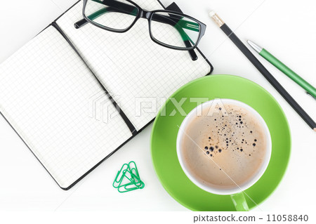 Coffee cup and office supplies Coffee cup and office supplies 11058840