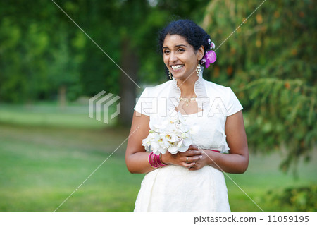 Beautiful happy indian bride after wedding ceremony. 11059195