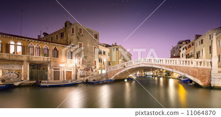 Night view of canals in Venice 11064870
