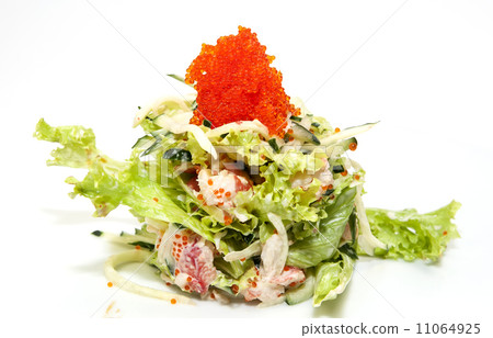 vegetable salad and caviar on a white background in the restaurant 11064925
