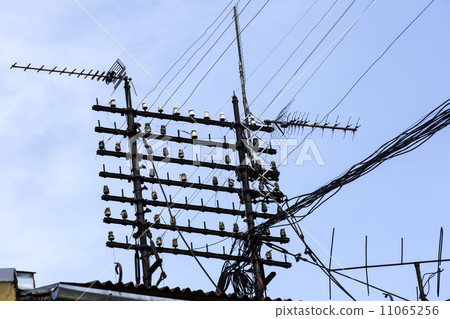 old antenna on a background of blue sky 11065256