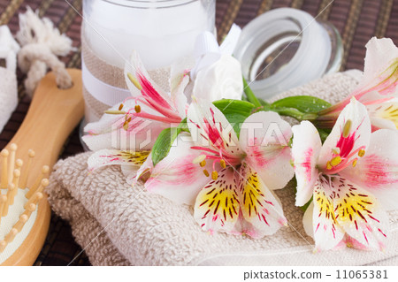 spa setting with alstroemeria flowers 11065381