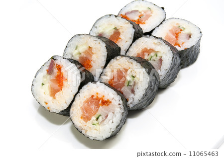 Japanese rolls in a restaurant with fish and vegetables Japanese rolls in a restaurant with fish and vegetables 11065463