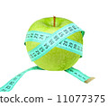 Measure tape on green apple 11077375