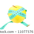 Measure tape on yellow apple 11077376
