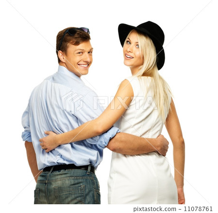 Beautiful smiling young couple isolated on white Beautiful smiling young couple isolated on white 11078761