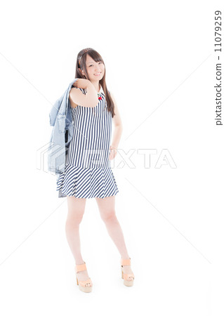 Fashionable and pretty school girls wearing bright and refreshing summer clothes 11079259