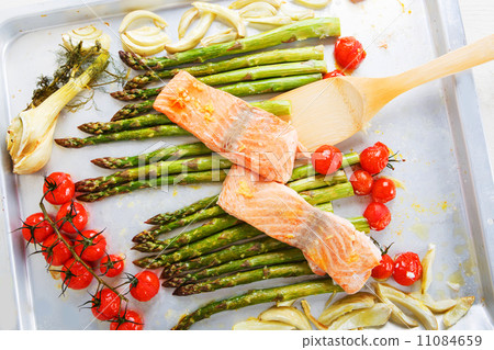 Salmon fish and green aspargus, cherry tomatoes and fennel Salmon fish and green aspargus, cherry tomatoes and fennel 11084659