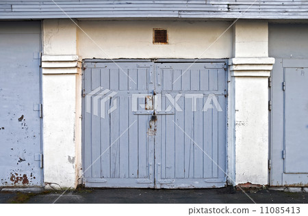 Old locked wooden garage door in Saint-Petersburg, Russia 11085413