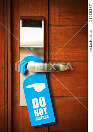 Do not disturb sign hang on door knob Do not disturb sign hang on door knob 11086387