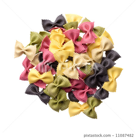 Heap of multicolor uncooked farfalle pasta Heap of multicolor uncooked farfalle pasta 11087482